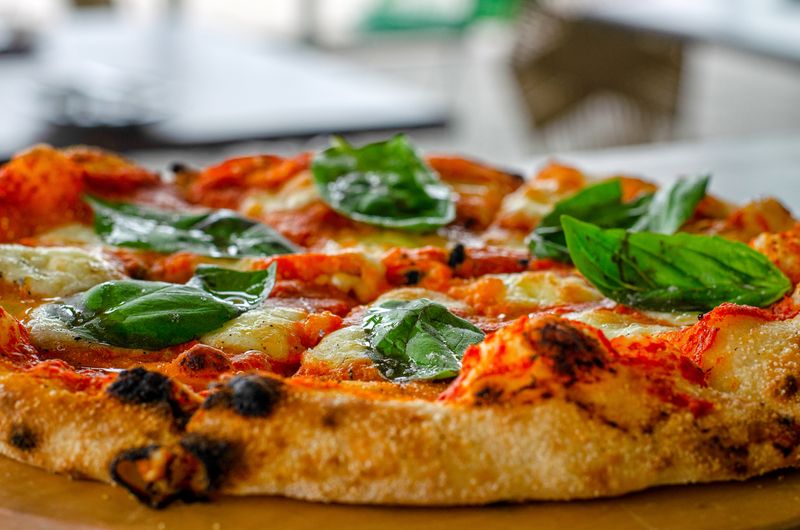 Pepperoni Supreme punch pizza fresh from the wood-fired oven