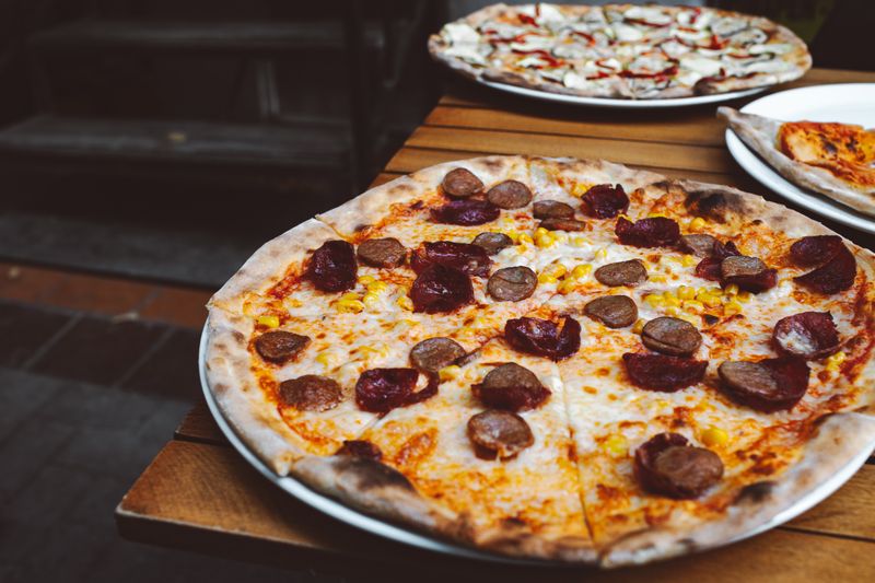 Meat Lovers pizza loaded with sausage, bacon, and pepperoni