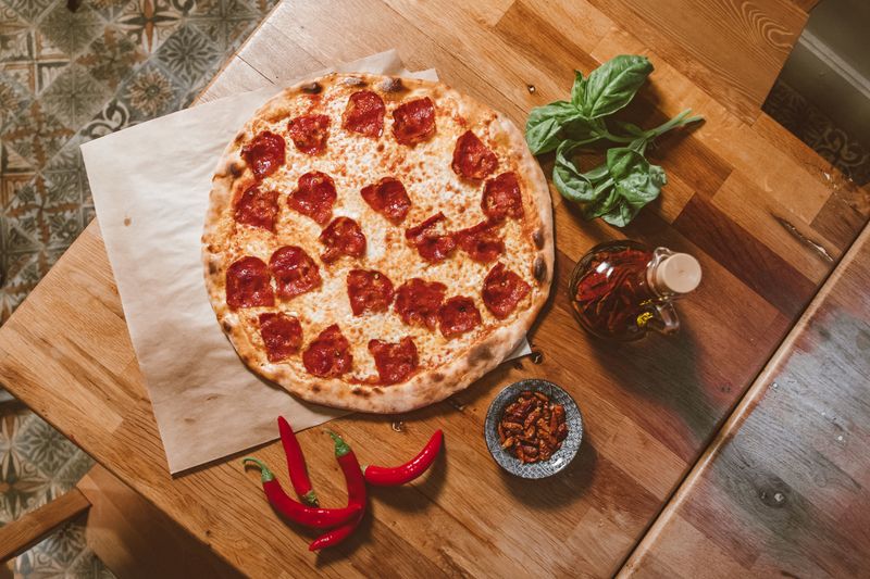 Classic Neapolitan style punch pizza with buffalo mozzarella